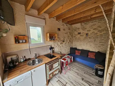 Cuisine ou kitchenette dans l'établissement La cabane de Normandie