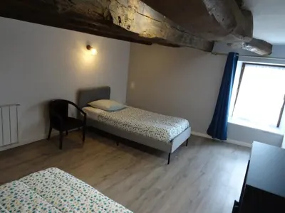 Un ou plusieurs lits dans un hébergement de l'établissement Gîte Aronde