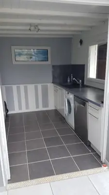 Cuisine ou kitchenette dans l'établissement La Maison Du Soleil Couchant - avec jardin - à 250 m de la plage - Véranda