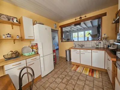 Cuisine ou kitchenette dans l'établissement La Maison Du Soleil Couchant - avec jardin - à 250 m de la plage - Véranda
