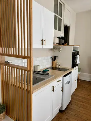 Cuisine ou kitchenette dans l'établissement Le Petit Louis
