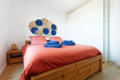 Un ou plusieurs lits dans un hébergement de l'établissement Appartement Aloha - Proche du Port de Carteret