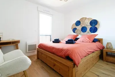 Un ou plusieurs lits dans un hébergement de l'établissement Appartement Aloha - Proche du Port de Carteret
