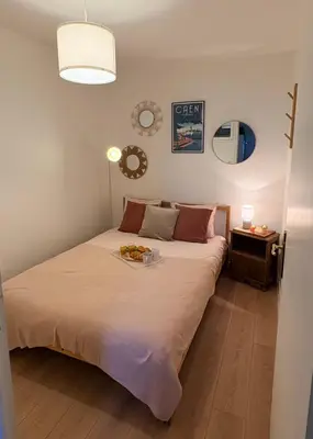 Un ou plusieurs lits dans un hébergement de l'établissement Cosy F2- Centre Caen & Abbaye