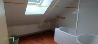 Salle de bains dans l'établissement Les Ecuries du Chateau