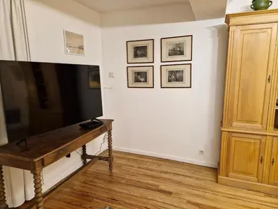 Télévision ou salle de divertissement dans l'établissement La Planche,