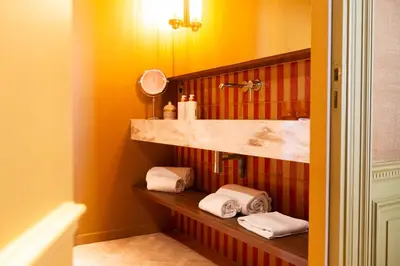 Salle de bains dans l'établissement Hôtel La Particulière