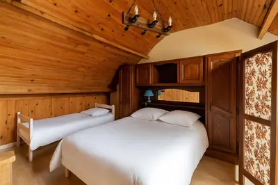 Un ou plusieurs lits dans un hébergement de l'établissement La Maison des Primevères - proche plages