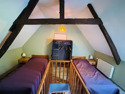 Un ou plusieurs lits dans un hébergement de l'établissement Chambre d'hôtes tout confort