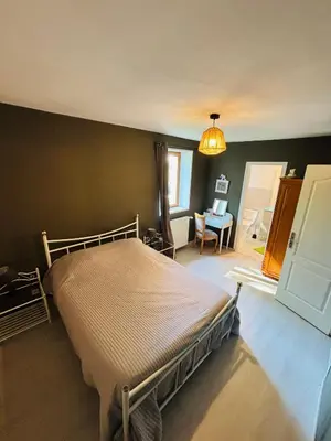 Un ou plusieurs lits dans un hébergement de l'établissement Chambre d'hôtes tout confort