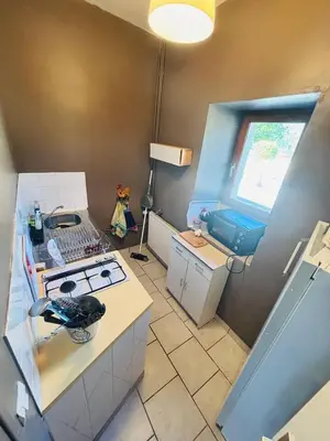 Cuisine ou kitchenette dans l'établissement Chambre d'hôtes tout confort