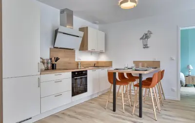 Cuisine ou kitchenette dans l'établissement Gite Gouville Sur Mer