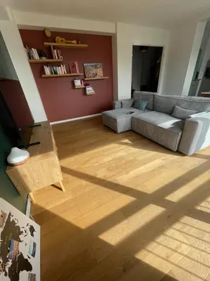 Coin salon dans l'établissement Chambre privée chez l'habitant avec accès à des espaces partagés