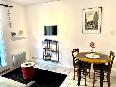 Télévision ou salle de divertissement dans l'établissement La Cabane de Riva Bella