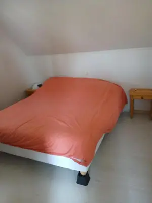 Un ou plusieurs lits dans un hébergement de l'établissement Chalet 5 personnes proche de la mer à Merville-Franceville-Plage