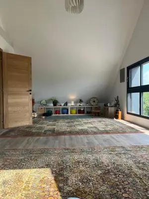 Un ou plusieurs lits dans un hébergement de l'établissement Chambre Forêt du Domaine de la Belle Verte