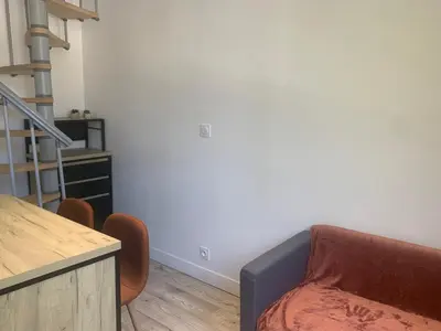Coin salon dans l'établissement Tiny duplex
