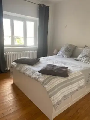 Un ou plusieurs lits dans un hébergement de l'établissement Appartement chaleureux et accueillant à quelques pas de la mer