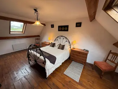 Un ou plusieurs lits dans un hébergement de l'établissement Luxury rural farmhouse retreat ideal for families with a jacuzzi hot tub
