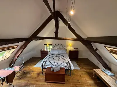 Un ou plusieurs lits dans un hébergement de l'établissement Luxury rural farmhouse retreat ideal for families with a jacuzzi hot tub