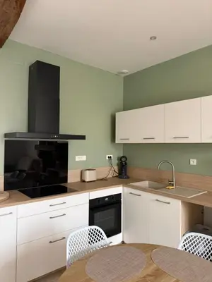 Cuisine ou kitchenette dans l'établissement Maison de ville - 3 chambres