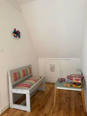 Coin salon dans l'établissement Maison de ville - 3 chambres