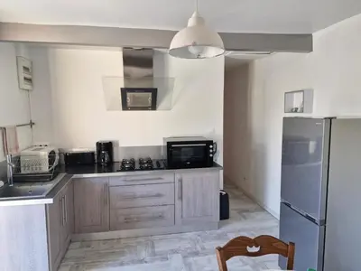 Cuisine ou kitchenette dans l'établissement Les Bleuets