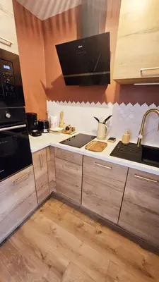 Cuisine ou kitchenette dans l'établissement Le Cocon de la Bizontine