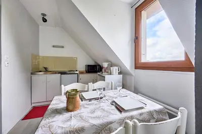 Cuisine ou kitchenette dans l'établissement Le Nid Marin - A 400m de la plage