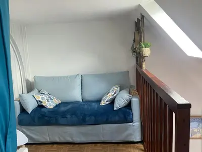 Coin salon dans l'établissement Apartment Cabourg Plage-22 by Interhome