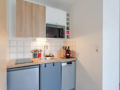 Cuisine ou kitchenette dans l'établissement Apartment Cabourg Plage-24 by Interhome