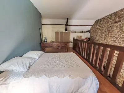 Un ou plusieurs lits dans un hébergement de l'établissement Holiday Home La Grulais by Interhome