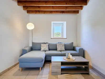Coin salon dans l'établissement Holiday Home Le Launay by Interhome