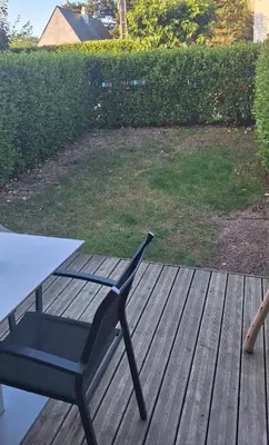 Jardin de l'établissement Studio - Merville Franceville 200 m de la plage