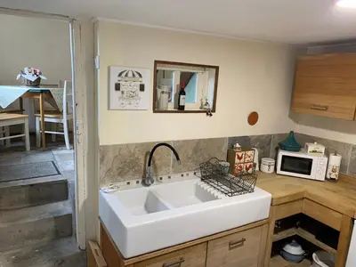 Cuisine ou kitchenette dans l'établissement La Petite Maison, Perrou, Normandy, Orne
