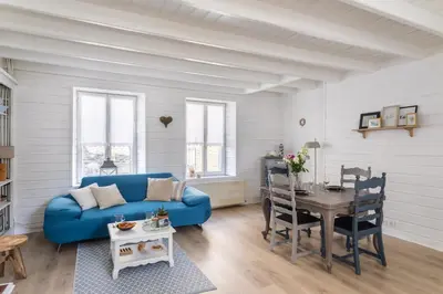 Coin salon dans l'établissement Désirée - Appartement en duplex à quelques pas du port