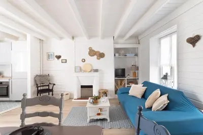 Coin salon dans l'établissement Désirée - Appartement en duplex à quelques pas du port