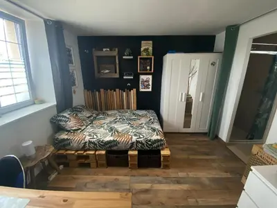 Coin salon dans l'établissement Petite maison de campagne