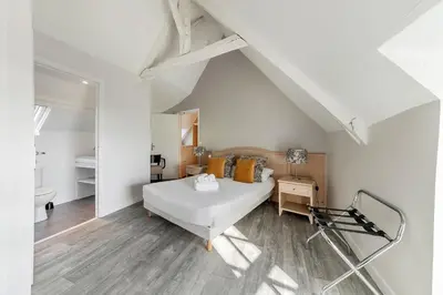 Un ou plusieurs lits dans un hébergement de l'établissement Bord de l'eau 1 - T3 duplex - Sea view