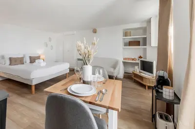 Un ou plusieurs lits dans un hébergement de l'établissement Bord de l'eau 2 - Studio - Sea view
