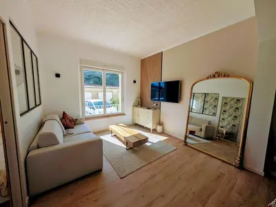 Télévision ou salle de divertissement dans l'établissement Bel appartement front de mer