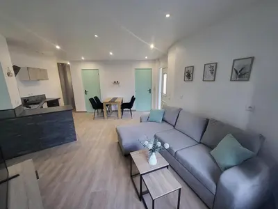 Coin salon dans l'établissement Appartement rez-de-chaussée