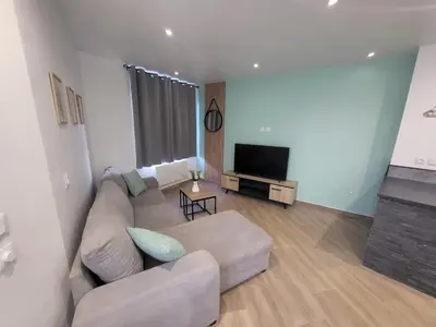 Télévision ou salle de divertissement dans l'établissement Appartement rez-de-chaussée