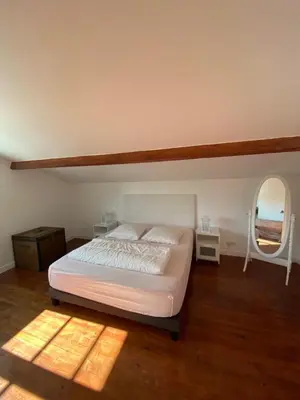 Un ou plusieurs lits dans un hébergement de l'établissement BEAU DUPLEX 80 m2 100 metre de la plage