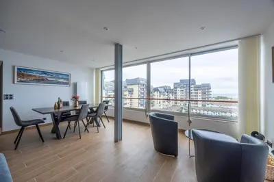Coin salon dans l'établissement Le penthouse des ours