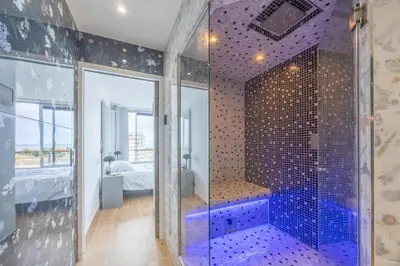 Salle de bains dans l'établissement Le penthouse des ours