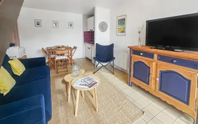 Télévision ou salle de divertissement dans l'établissement F2 cosy avec balcon