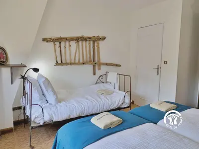Un ou plusieurs lits dans un hébergement de l'établissement Gîte Lign' Du Bois, 7 personnes