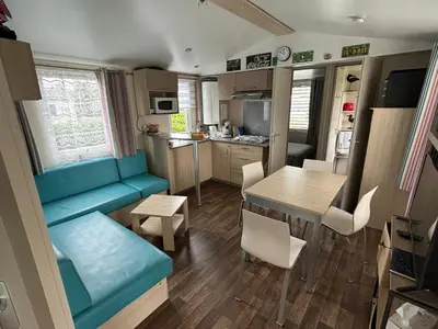 Cuisine ou kitchenette dans l'établissement Omaha beach mobilhome