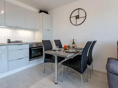 Cuisine ou kitchenette dans l'établissement Apartment Le Trimaran-4 by Interhome